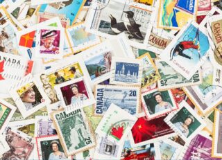 A colorful assortment of postage stamps from Canada.