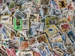 A colorful assortment of postage stamps from various European countries.