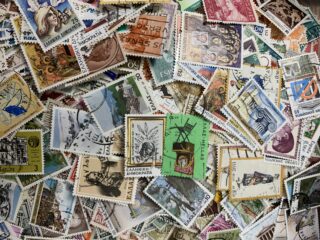 A colorful assortment of postage stamps from various European countries.