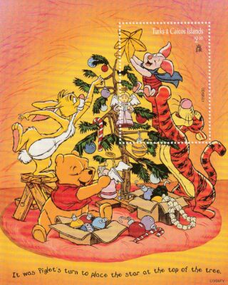 Winnie the Pooh and friends decorate a Christmas tree with Piglet placing the star.